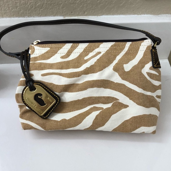 Dooney & Bourke Handbags - Ladies small travel handbag